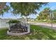 The Hammocks neighborhood sign surrounded by greenery and landscaping at 903 Deer Springs Rd, Port Orange, FL 32129