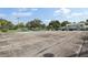 Community tennis and basketball courts surrounded by mature trees and landscaping at 903 Deer Springs Rd, Port Orange, FL 32129