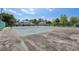 Community tennis and basketball courts surrounded by mature trees and landscaping at 903 Deer Springs Rd, Port Orange, FL 32129