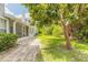 The backyard showcases a screened patio with a quaint yard offering a peaceful outdoor space at 961 S Lakewood Ter # C, Port Orange, FL 32127