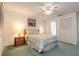 This bedroom is well lit with two lamps and natural light at 961 S Lakewood Ter # C, Port Orange, FL 32127