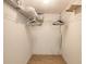 Empty closet with wood floor, white walls, and a wire shelf at 961 S Lakewood Ter # C, Port Orange, FL 32127