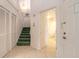 Foyer with stairs, tile floors, and a hall closet at 961 S Lakewood Ter # C, Port Orange, FL 32127