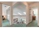 Hallway with carpet and stairway at 961 S Lakewood Ter # C, Port Orange, FL 32127