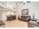 Open floor plan showcases the living room connected to the dining and kitchen at 961 S Lakewood Ter # C, Port Orange, FL 32127