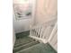 Carpeted stairs leading downward at 961 S Lakewood Ter # C, Port Orange, FL 32127