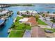 Waterfront home with private docks, lush landscaping, and stunning views of the canal and surrounding area at 10 Venetian Cir, Port Orange, FL 32127