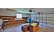 This is a spacious two-car garage with a workbench and access to the house at 1017 Chippewa Trl, Daytona Beach, FL 32117