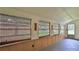 This sunroom is bright and airy, with bamboo shades and a view of the backyard at 1017 Chippewa Trl, Daytona Beach, FL 32117
