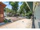 Spacious backyard featuring a brick fire pit area and water access at 1085 Indigo Rd, Ormond Beach, FL 32174