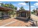 Dock with seating and covered area perfect for enjoying waterfront views at 1085 Indigo Rd, Ormond Beach, FL 32174