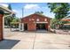 Garage including an open layout, plenty of room for multiple cars, and storage shelves at 1085 Indigo Rd, Ormond Beach, FL 32174