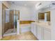 Bright bathroom equipped with a shower and bath, double sinks, and decorative finishes at 112 Tuscany Bend St, Daytona Beach, FL 32117