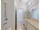 View of the primary bathroom with tile floors and marble countertops at 112 Tuscany Bend St, Daytona Beach, FL 32117