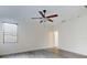 Unfurnished bedroom showcasing wood flooring, a ceiling fan, and natural light at 112 Tuscany Bend St, Daytona Beach, FL 32117