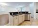 Kitchen island with stainless steel dishwasher, ample storage, granite counters and sink at 112 Tuscany Bend St, Daytona Beach, FL 32117