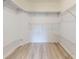 Large walk-in closet with built-in shelving provides ample storage space at 112 Tuscany Bend St, Daytona Beach, FL 32117