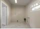Clean basement space with marble tile flooring and a window for natural light at 118 N Sunland Dr, Sanford, FL 32773