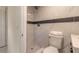 Modern bathroom featuring marble tiling, a shower, and updated fixtures at 118 N Sunland Dr, Sanford, FL 32773