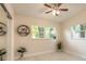 Bright bedroom with large windows providing plenty of natural light and sleek marble floors at 118 N Sunland Dr, Sanford, FL 32773