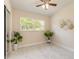 Minimalist bedroom with ample natural light and sleek marble floors at 118 N Sunland Dr, Sanford, FL 32773