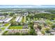 Expansive aerial view of the property and surrounding neighborhood amenities at 118 Tuscany Villas Dr, Edgewater, FL 32141