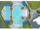 Aerial view of a community pool featuring a complex with multiple pools and lounging areas at 141 Mosaic Blvd, Daytona Beach, FL 32124