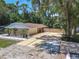 This home has a well-maintained exterior, with a spacious driveway and beautiful landscaping, enhancing its curb appeal at 1516 Arrowhead Trl, Enterprise, FL 32725