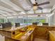 Wet bar features unique wood-style design in covered outdoor space with views of pool at 1516 Arrowhead Trl, Enterprise, FL 32725