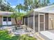 A charming home featuring a screened lanai, offering an inviting space to enjoy the outdoors at 1516 Arrowhead Trl, Enterprise, FL 32725