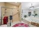Bathroom showcasing a tiled shower, a jetted tub, and bright lighting at 1555 Mercers Fernery Rd, Deland, FL 32720