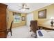 Spacious bedroom with carpet, a ceiling fan, and a closet for storage at 1555 Mercers Fernery Rd, Deland, FL 32720