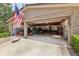 Bright garage featuring a variety of tools and equipment, with ample room for parking at 1555 Mercers Fernery Rd, Deland, FL 32720