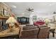 Spacious living room featuring comfortable furniture and a large television at 1555 Mercers Fernery Rd, Deland, FL 32720