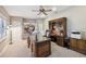 Well-lit office space with a decorative ceiling fan, offering a productive work environment at 1555 Mercers Fernery Rd, Deland, FL 32720