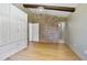 Bright bedroom with large wardrobe and stylish chandelier, offering ample storage space at 1620 20Th St, Orange City, FL 32763