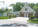 Charming home features a two-car garage with pergola and well-maintained landscaping at 1620 20Th St, Orange City, FL 32763