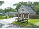 Charming home features a two-car garage with pergola and well-maintained landscaping at 1620 20Th St, Orange City, FL 32763
