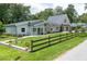 Landscaped front yard with stone accents and well-maintained lawn at 1620 20Th St, Orange City, FL 32763