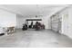 Spacious garage with ample storage space and room for parking a golf cart at 1620 20Th St, Orange City, FL 32763