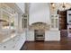 Modern kitchen with white cabinetry, stainless steel appliances, and brick backsplash at 1620 20Th St, Orange City, FL 32763