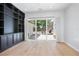 Bright living room with sliding glass doors leading to outdoor patio and pool at 1620 20Th St, Orange City, FL 32763