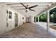 Spacious covered patio with ceiling fans, offering a seamless indoor-outdoor living experience at 1620 20Th St, Orange City, FL 32763