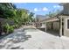Beautiful pool with surrounding patio and lush landscaping offers a private backyard oasis at 1620 20Th St, Orange City, FL 32763