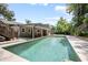 Inviting backyard pool with a covered patio, perfect for relaxing and entertaining at 1620 20Th St, Orange City, FL 32763