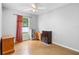Neutral bedroom featuring wood floors, storage, and natural light at 1725 12Th St, Orange City, FL 32763
