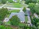 Aerial view of the property showcasing the roof, landscape, and outdoor features, plus proximity to area amenities at 1734 Magnolia Ave, Deland, FL 32724