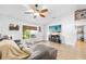 Cozy living room featuring hard wood floors, neutral colored walls, and recessed lighting at 1734 Magnolia Ave, Deland, FL 32724