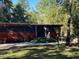 Exterior view of the home's entrance and a small porch with a 'Welcome' sign at 17531 Ne 139Th Ave, Fort Mc Coy, FL 32134
