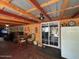 Open-plan living and cooking space features a sliding glass door and plenty of natural light at 17531 Ne 139Th Ave, Fort Mc Coy, FL 32134